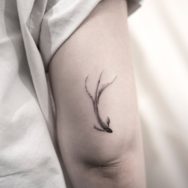 tattoo femenino de carpa 26