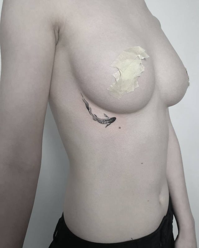 tattoo femenino de carpa 71