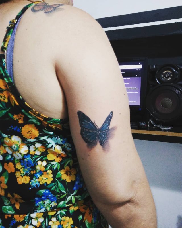 tattoo femenino de mariposa en 3d 60