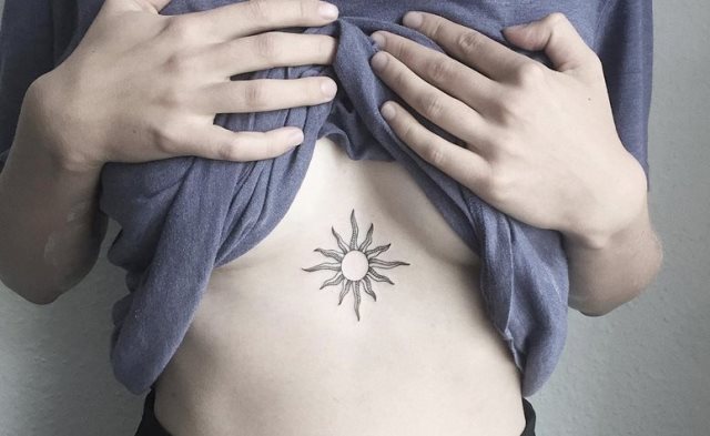tattoo femenino del sol 31
