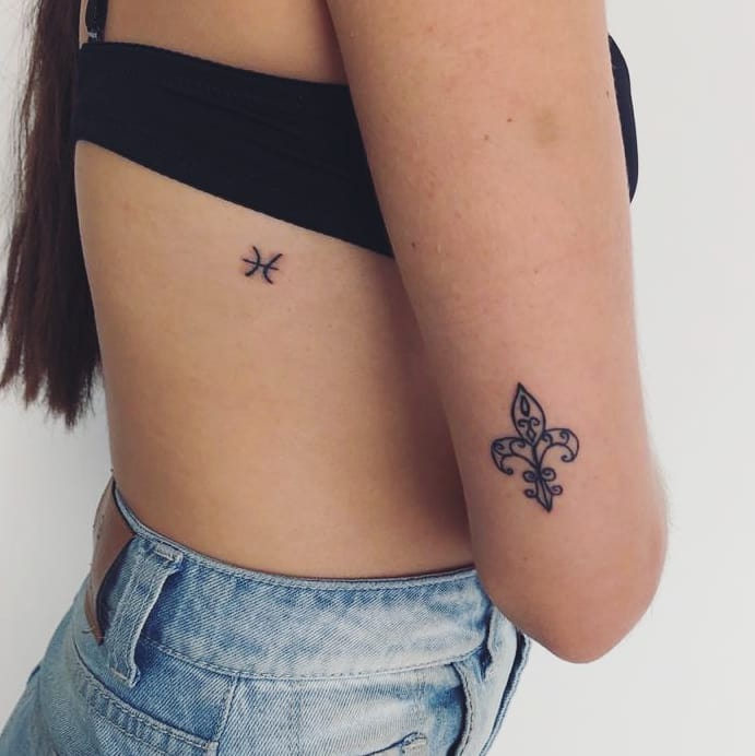 tattoo femenino flor de lis 26