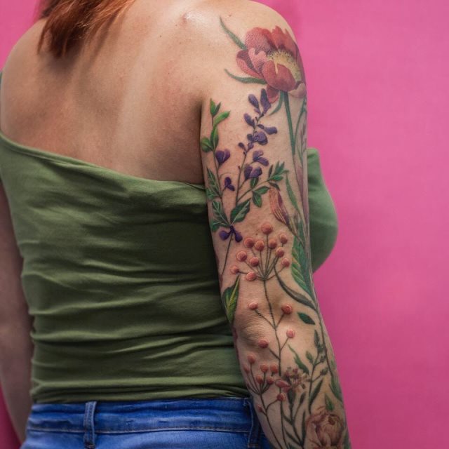 tattoo femenino flor para el brazo 80