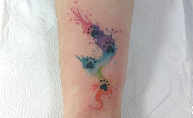 tattoo femenino huella pata de perro 35