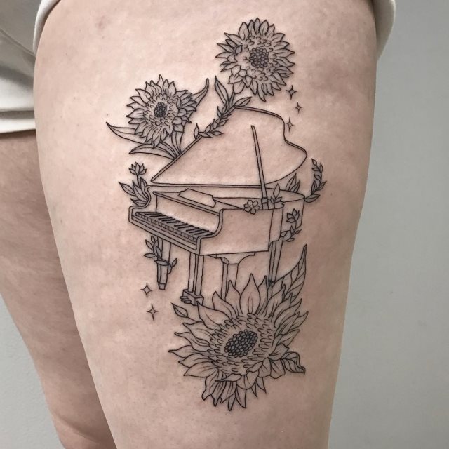 tattoo femenino musical 36