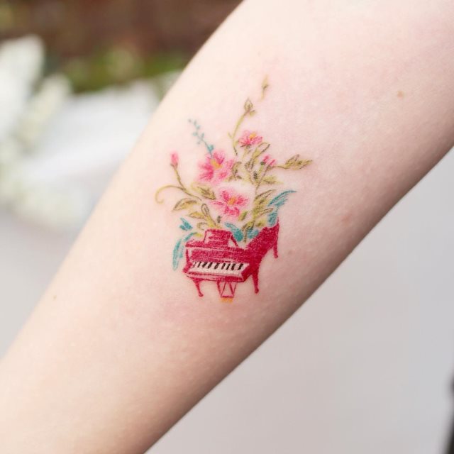tattoo femenino musical 39