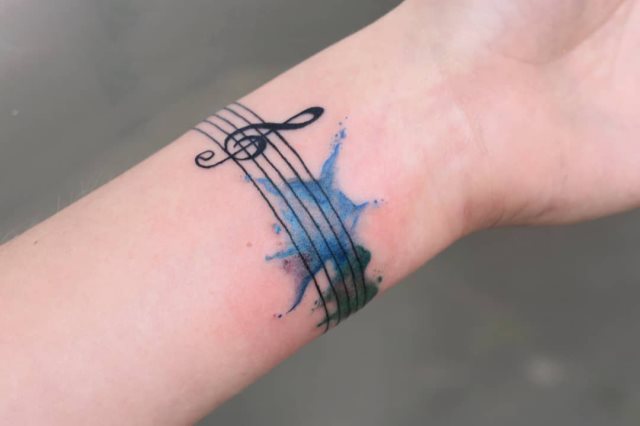 tattoo femenino musical 67