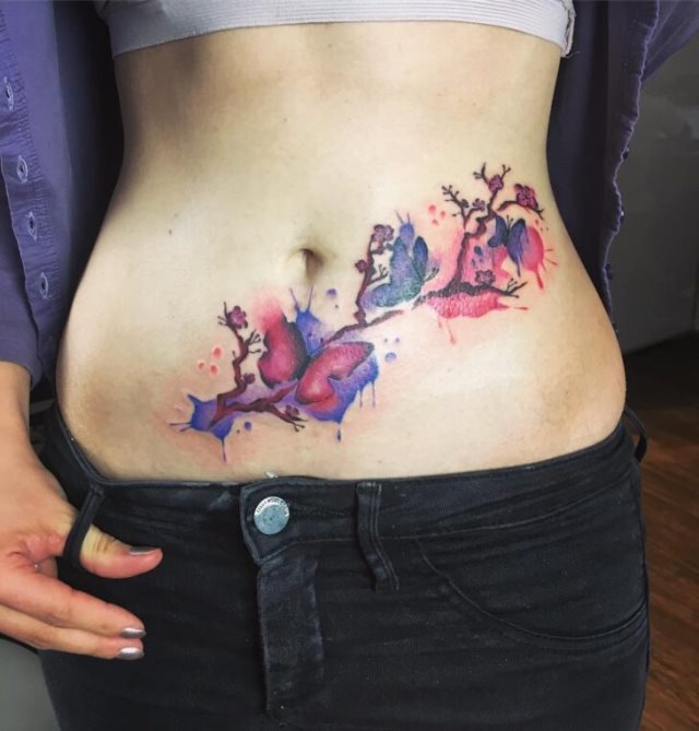 tattoo femenino para la barriga 44