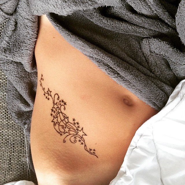 tattoo femenino para la barriga 51