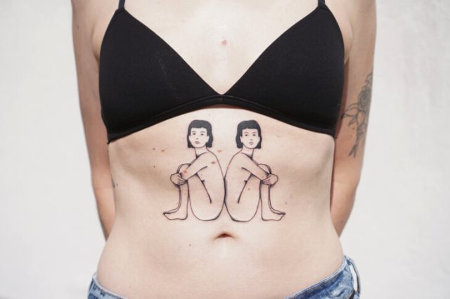 tattoo femenino para la barriga 59