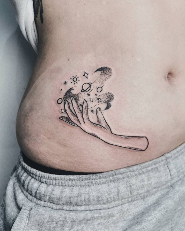 tattoo femenino para la pelvis 44