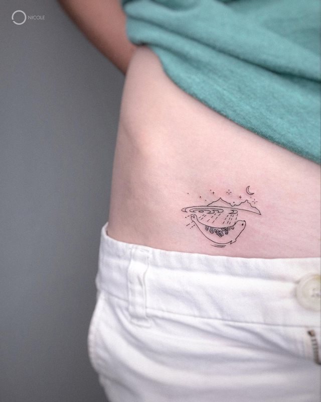 tattoo femenino para la pelvis 45
