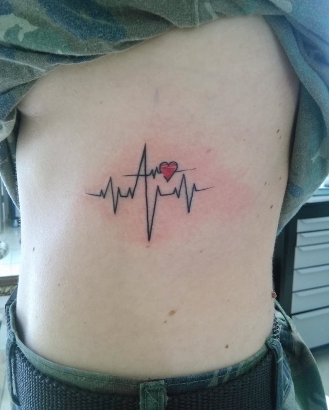 tattoo femenino para las costillas 29