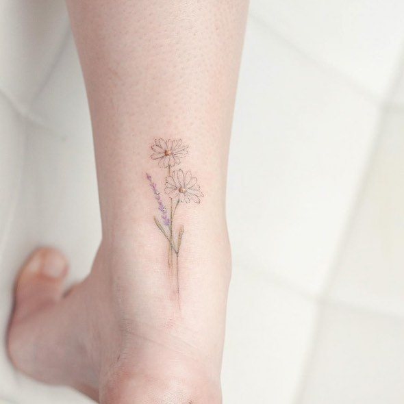 tattoo femenino pequeno en el brazo 21