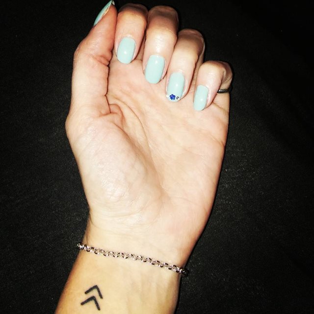 tattoo femenino pequeno en el brazo 40