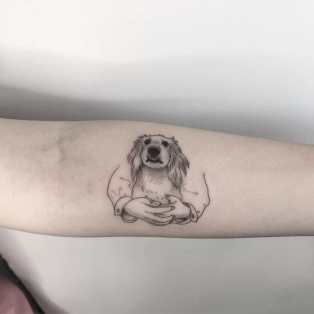 tattoo femenino perro 69