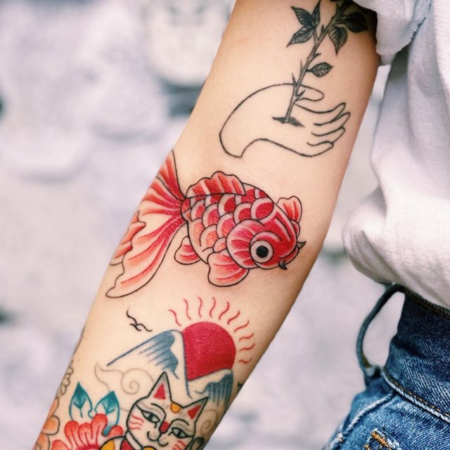 tattoo femenino pez 24