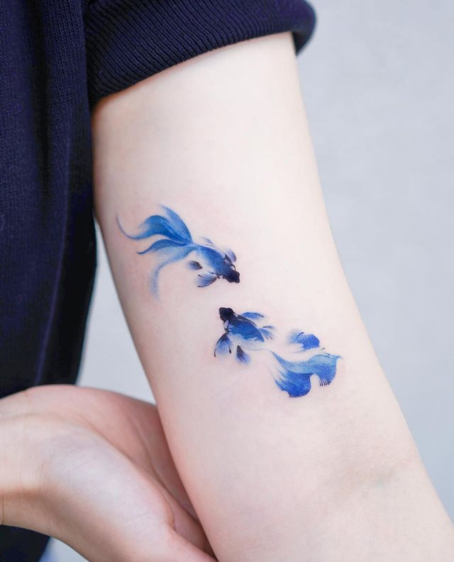 tattoo femenino pez 62