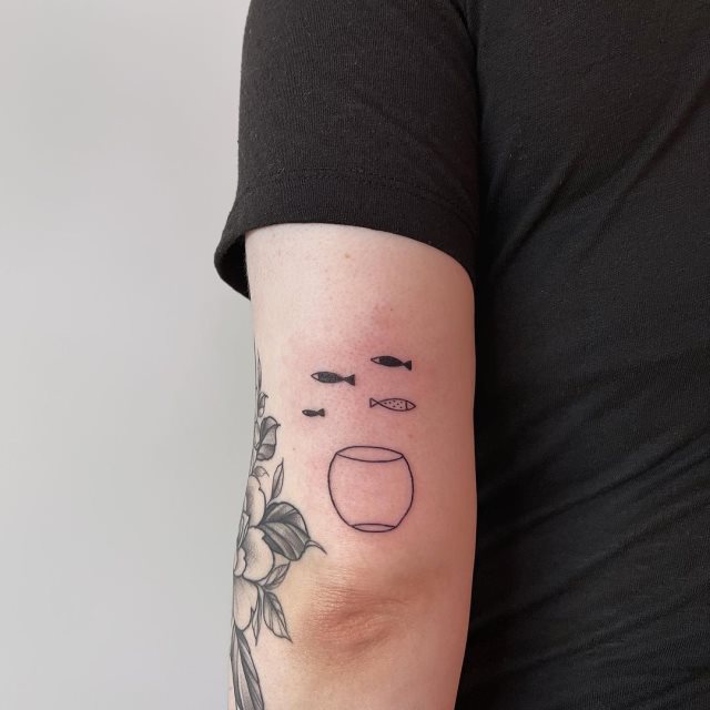 tattoo femenino pez 69