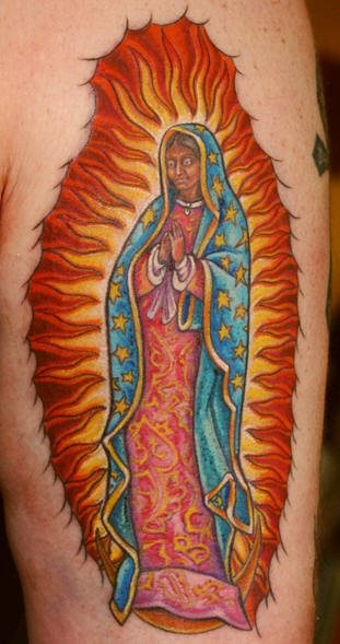 Para terminar, esta fantástica virgen rodeado de fuego.