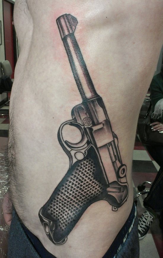 tatuaje pistola 14