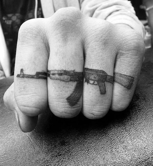 tatuaje pistola 21