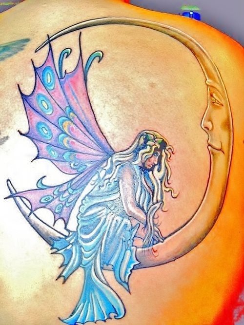 Diseo de una luna con un hada posada en la misma Diseo de una luna con un hada posada en la misma