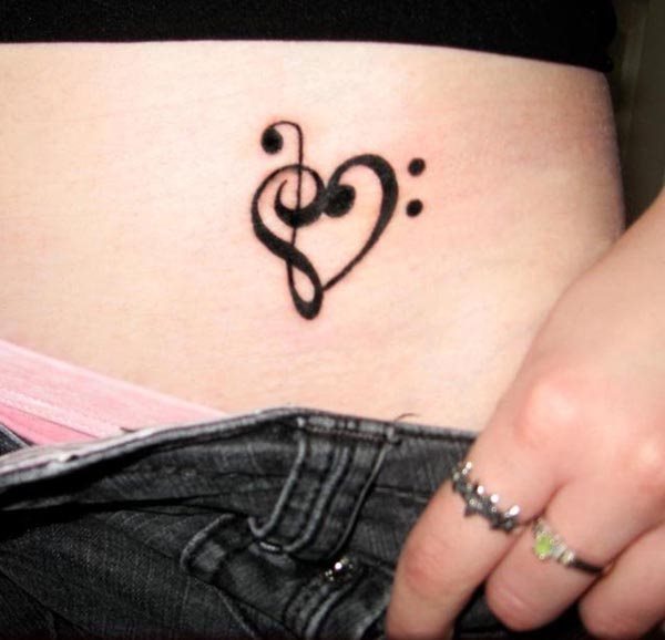 Clave de sol y de fa unidas formando un corazn Clave de sol y de fa unidas formando un corazn