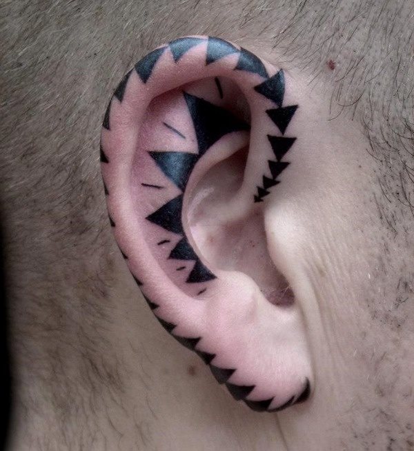 Diseo de tringulos en tonos negros dispuestos de manera geomtrica por lo que dan una sensacin de equilibrio hablando en trminos visuales Diseo de tringulos en tonos negros dispuestos de manera geomtrica por lo que dan una sensacin de equilibrio hablando en trminos visuales