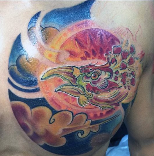 tatuaje fenix para hombre 55