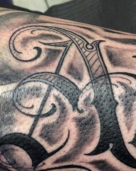 tatuaje letras para hombre 52