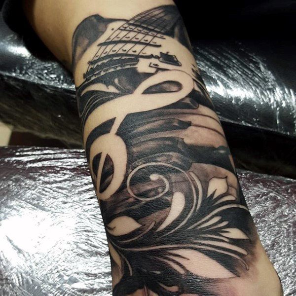 tatuaje musica para hombre 78