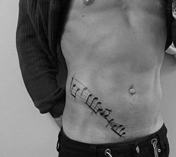 tatuaje musical para hombre 18