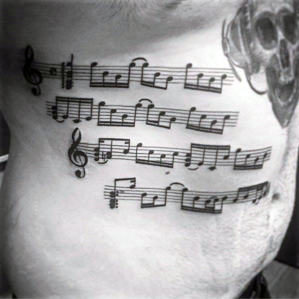 tatuaje musical para hombre 29