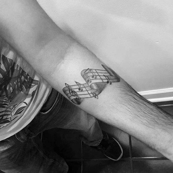 tatuaje musical para hombre 32