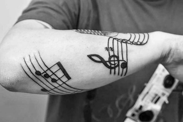 tatuaje musical para hombre 33