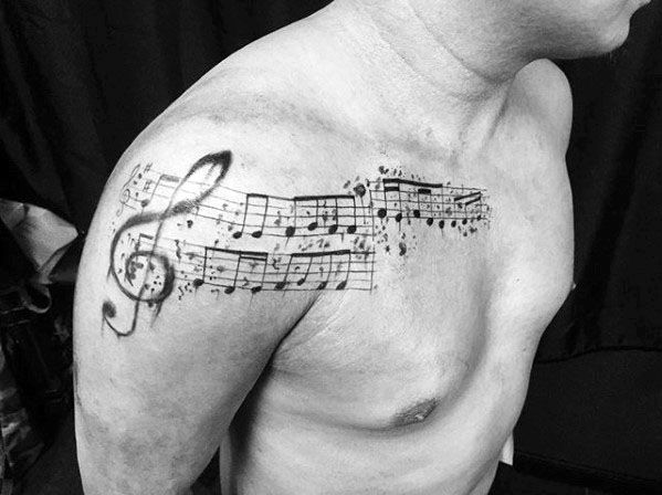 tatuaje musical para hombre 35