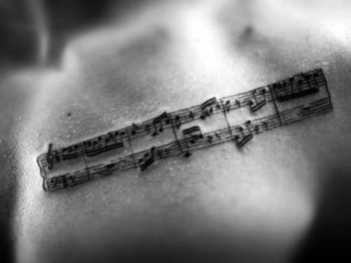 tatuaje musical para hombre 38