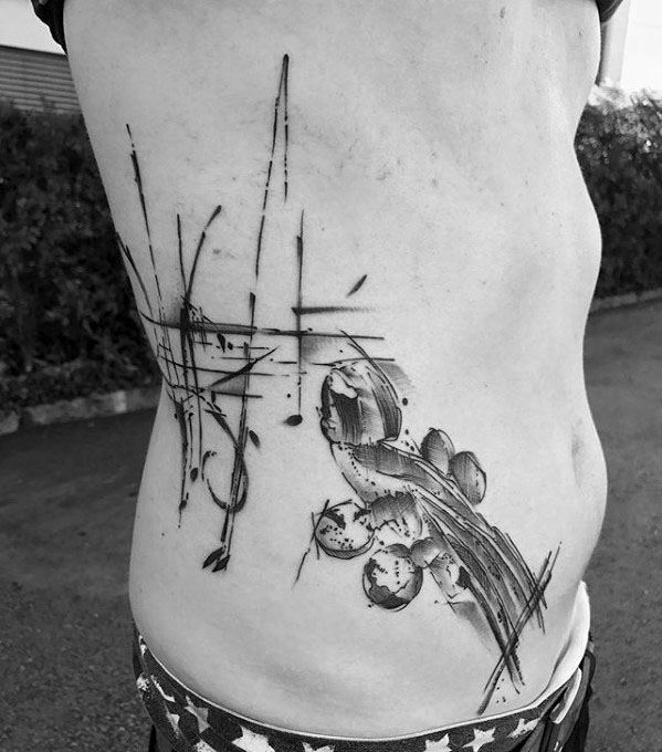 tatuaje musical para hombre 40