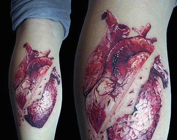 tatuaje corazon realista para hombre 04