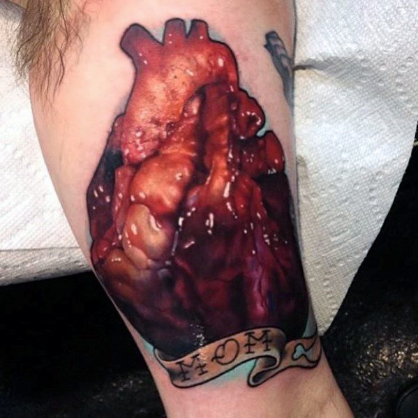 tatuaje corazon realista para hombre 10