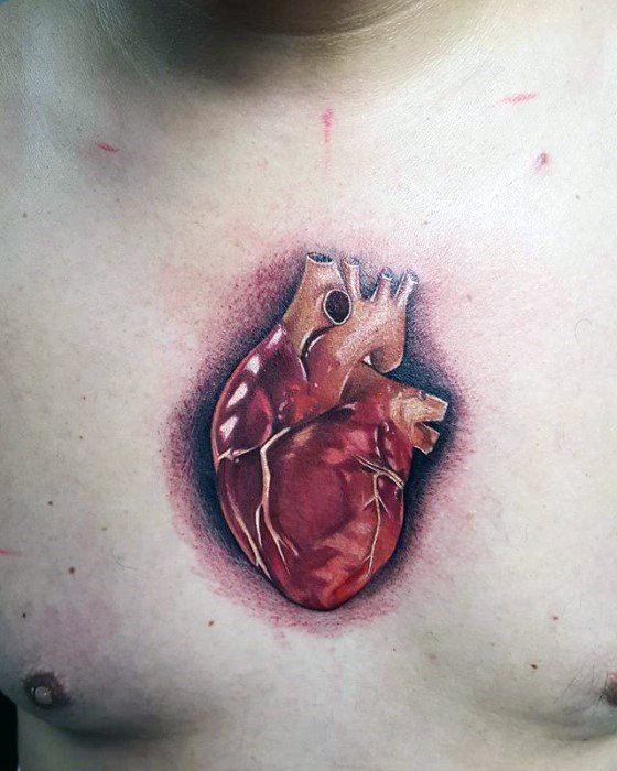 tatuaje corazon realista para hombre 15