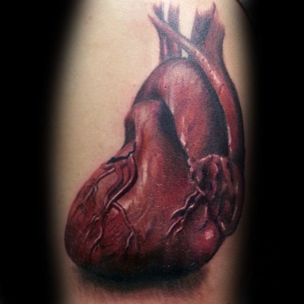 tatuaje corazon realista para hombre 17