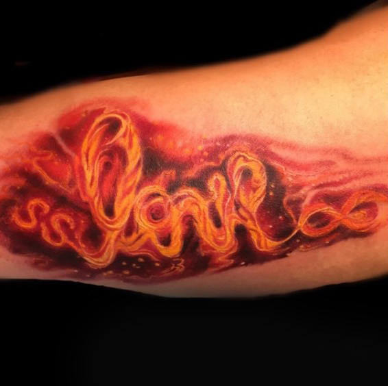 tatuaje fuego para hombre 36