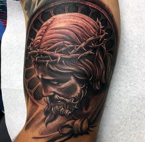tatuaje jesus brazo para hombre 24