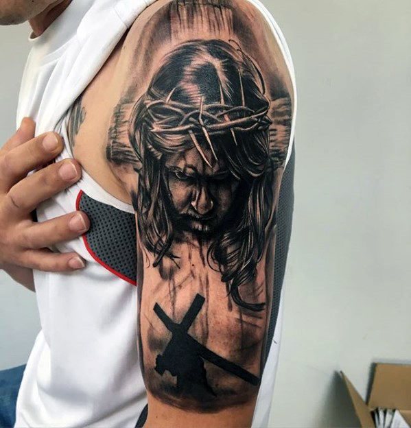 tatuaje jesus brazo para hombre 27
