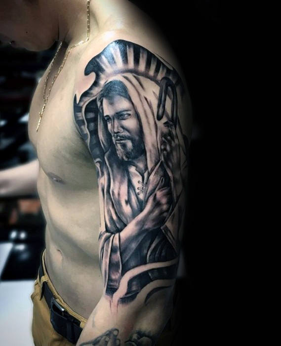 tatuaje jesus brazo para hombre 33