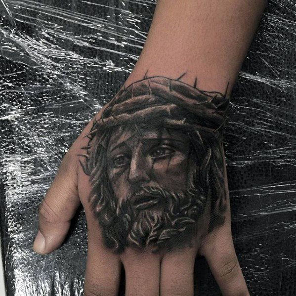 tatuaje jesus mano para hombre 08