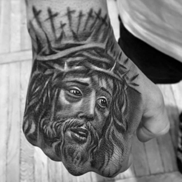 tatuaje jesus mano para hombre 13