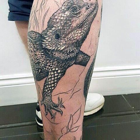 tatuaje lagarto para hombre 69