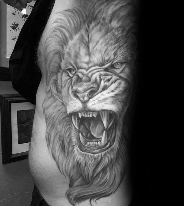 tatuaje leon realista para hombre 10